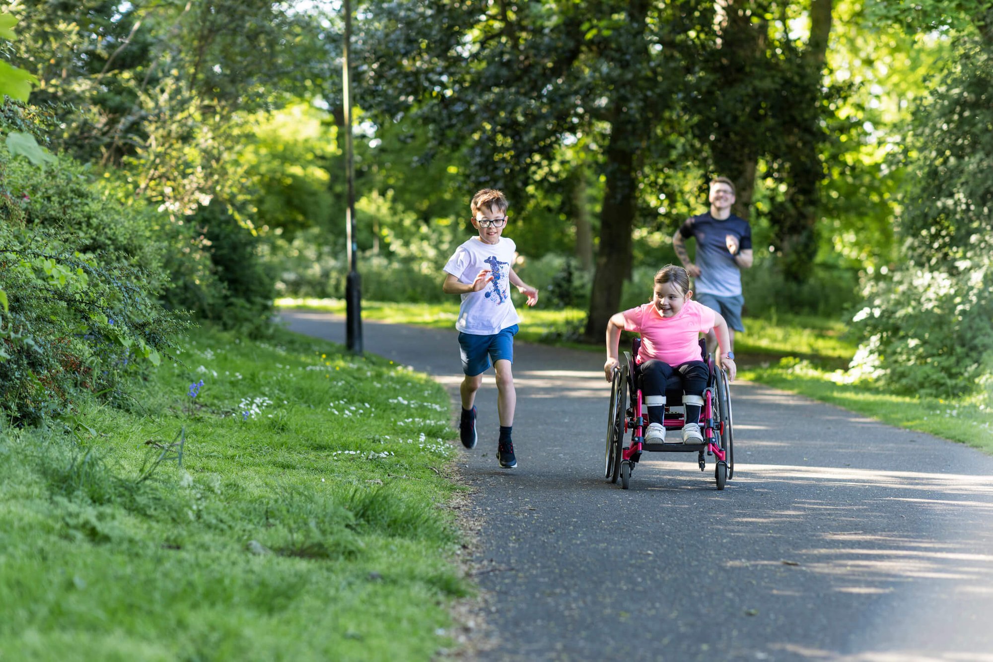 Children in park on wheelchair
